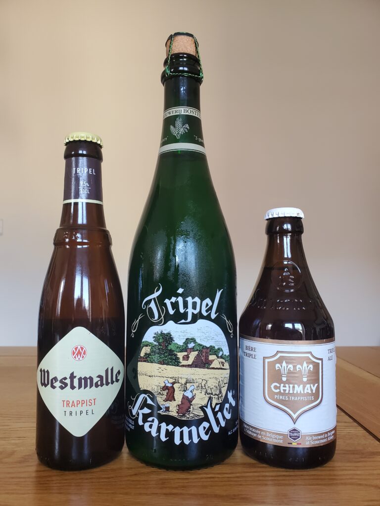 Three bottles of beer - Westmalle Trappist Tripel, Tripel Karmeliet, Chimay