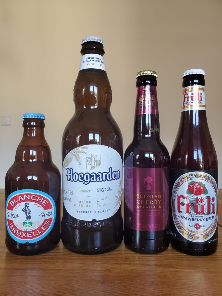 Four bottles of Belgian beer.