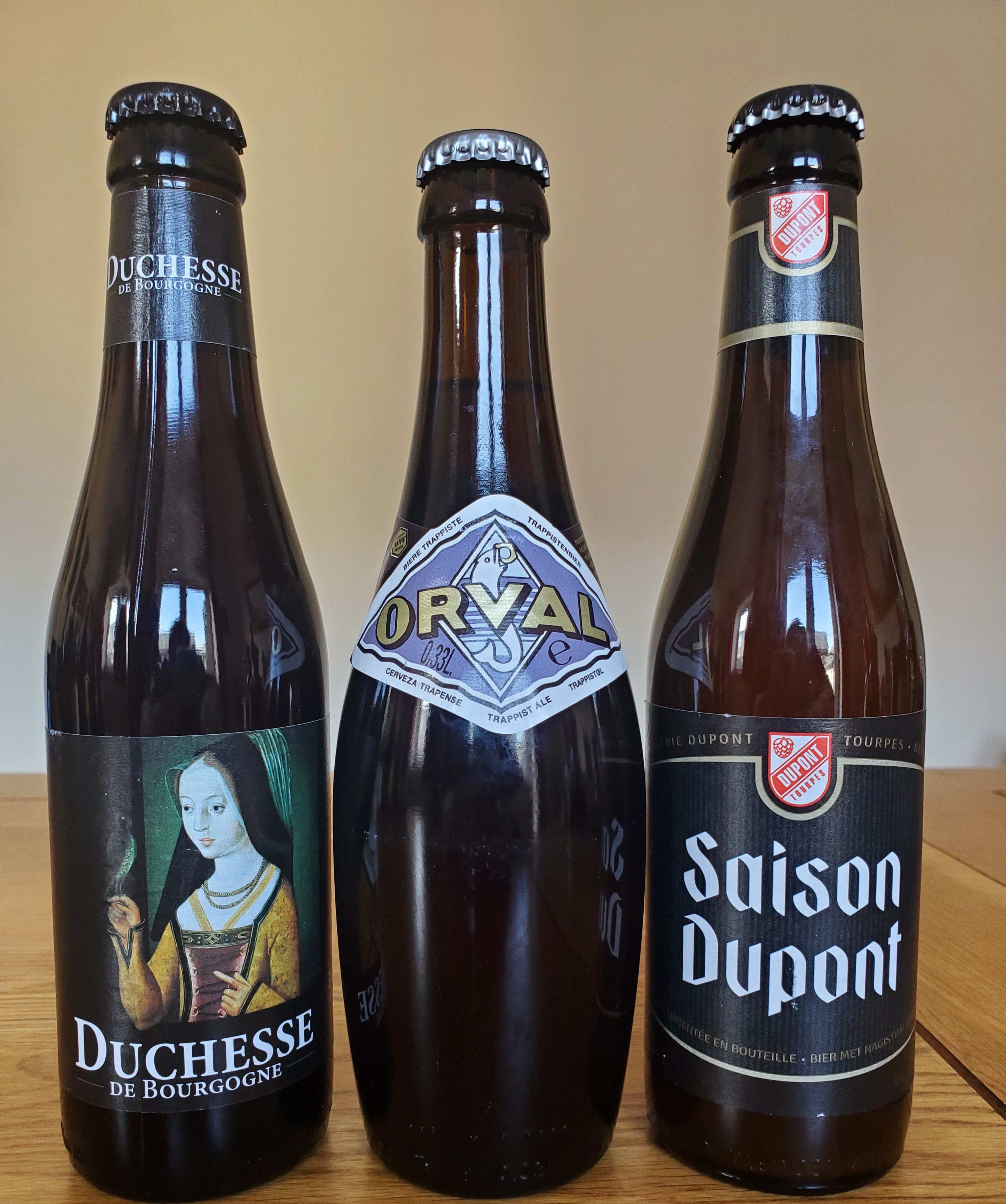 Three bottles of Belgian beer - Duchesse de Bourgogne, Orval and Saison Dupont