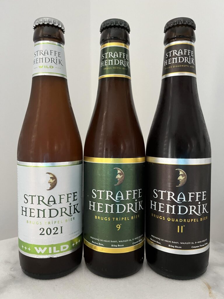 Three bottles of Straffe Hendrik beer